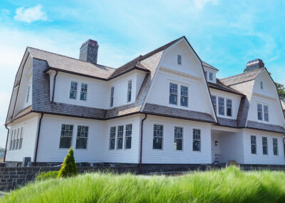 Roofing Contractor Colts Neck, NJ replaces roof and siding with Timeless Materials.