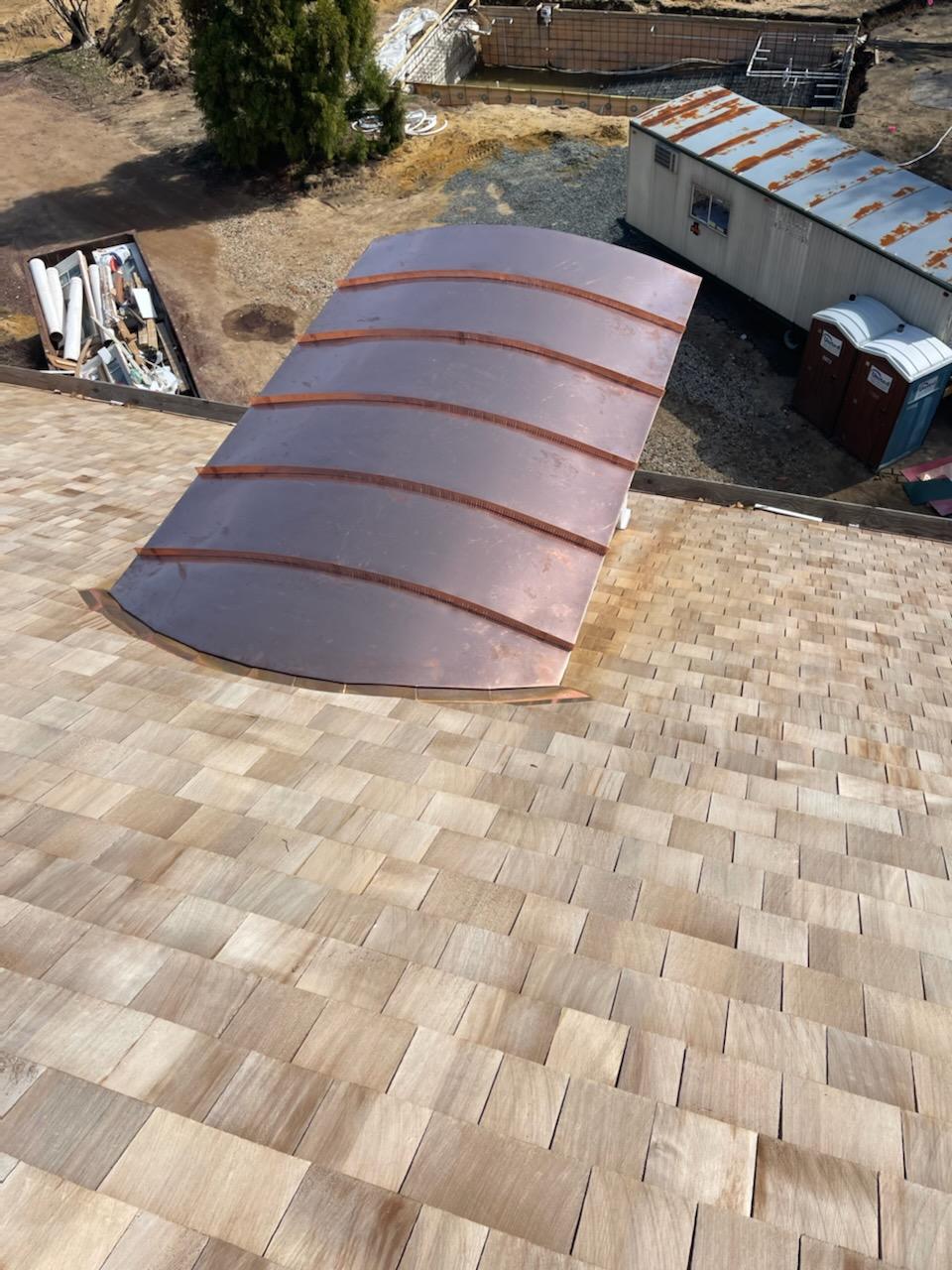 Metal roofing installed on a residential roof section in Monmouth County NJ